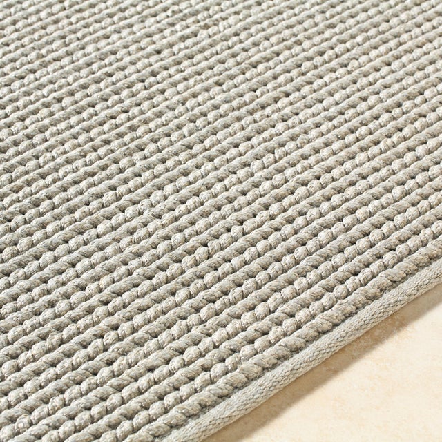Add a touch of coastal charm to your home with the Beach House Hand Made Rug. Expertly hand woven in India, this rug is...