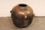 A larger-sized Guatemalan clay pot with beautiful glazed finish. This vintage cooking vessel has been made of clay, has a...
