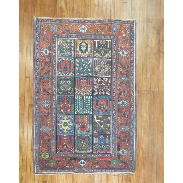An early 20th Century Fine Senneh Bakhtiari rug with a compelling all over garden box design throughout. Measures: 4.9'' x...