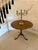 A fine Georgian figured mahogany circular tilt top table raised on a well proportioned turned pedestal with elegant tripod...