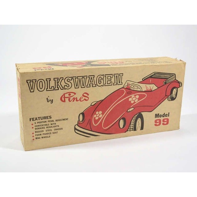 Made by Pines of America Inc. of Fort Wayne, Indiana this exceptional vintage VW pedal car comes with its original...