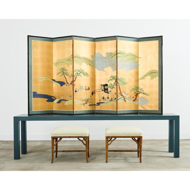 Amazing bespoke 9 foot long parsons console table made on a grand scale. The long wood frame is embellished with a...