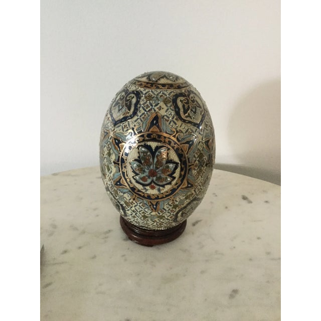 Gorgeous vintage, medium size Satsuma style Hand-Painted Gold Porcelain Egg with lotus motifs. The details are exquisite...
