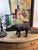 Wood and leather hippopotamus sculpture. This guy pretty look good any where you place him. If you want some friendly fun...