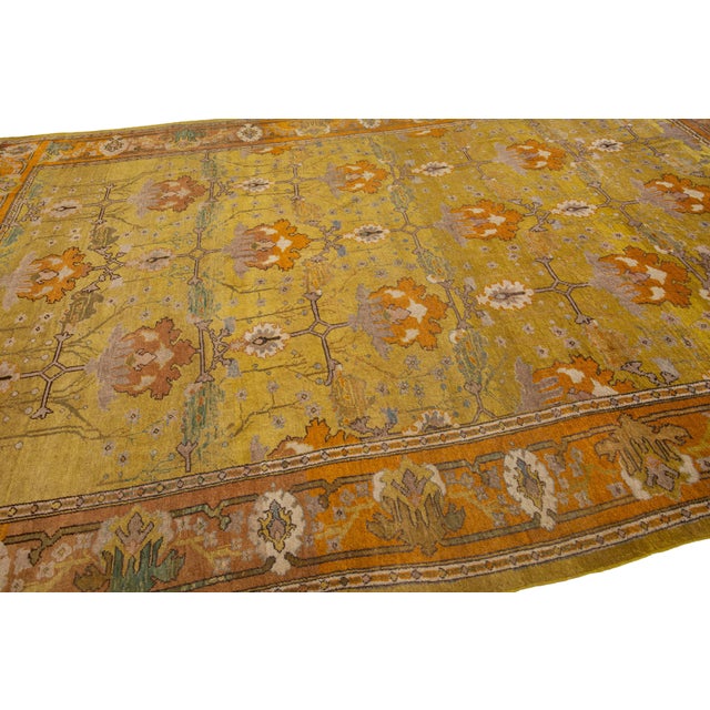 Textile Vintage Arts and Crafts Style Golden Ochre Wool Rug With Stylized Floral Motif For Sale - Image 7 of 11