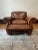 This solid and sturdy recliner features a rich, warm chocolate brown leather upholstery, which has aged over time with a...