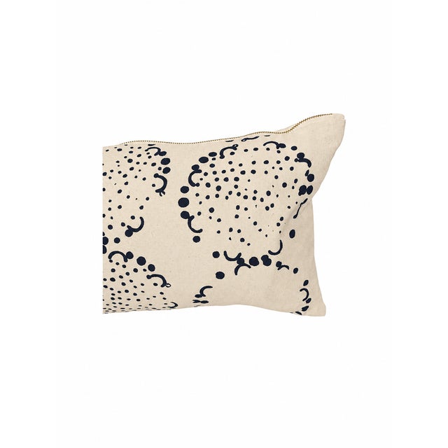 Striking artisan lumbar pillow by Maine textile designer Erin Flett, featuring an organic hand-printed navy blue pattern...