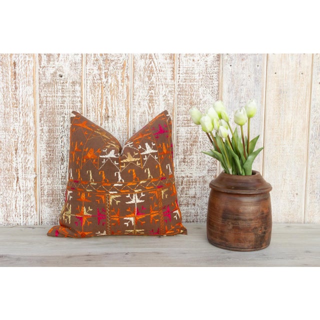 This colorful and luxurious Bagh Phulkari pillow features beautiful hand-done silk embroidery on top of a cotton fabric....