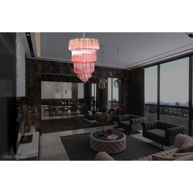 Fantastic and big Murano chandelier made by 112 Murano pink prism "quadriedri" in a nickel metal frame. Period: late 20th...