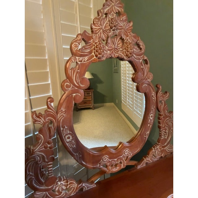 Antique hand-crafted vanity with unique detailing.