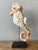 This exceptional vintage sculpture captures the whimsical elegance of the ocean in a stunning figural form. Meticulously...