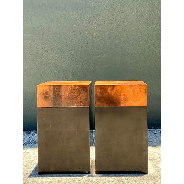 This sophisticated pair of vintage drinks tables is a masterclass in Postmodern geometric design and material contrast....
