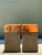 This sophisticated pair of vintage drinks tables is a masterclass in Postmodern geometric design and material contrast....