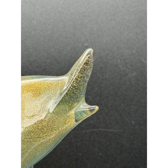 Murano glass dolphin from the 1970s. The figure is hand-sculpted and embellished with gold leaf fused into the glass,...