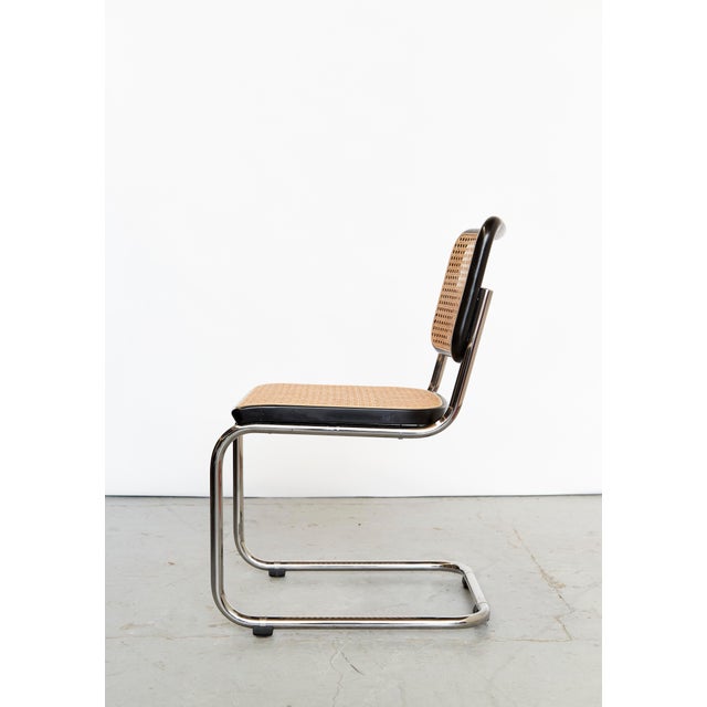 Condition: the wickerwork has been reinforced with a mesh backing. Otherwise, moderate signs of wear. marcel breuer was a...