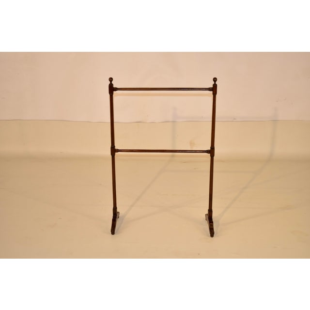 Early 19th century oak blanket or quilt rack from England. The top of the rack is decorated with hand turned finials,...