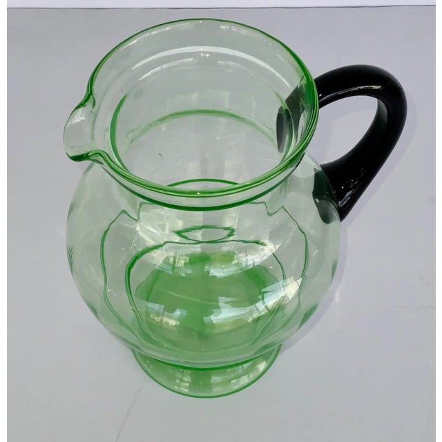 Timeless Large Vintage Green Czech Art Glass Pitcher, black handle, circa early 1900’s