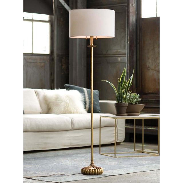 Add a touch of elegant style to your home with the Clove Stem Floor Lamp. With a dramatic base finished in antiqued gold,...