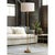 Add a touch of elegant style to your home with the Clove Stem Floor Lamp. With a dramatic base finished in antiqued gold,...