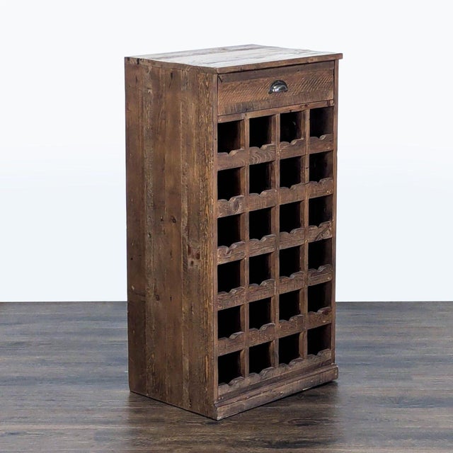 Reclaimed wood wine rack with drawer holds 24 bottles. Brand: Pottery Barn. Dimensions (in): 22W x 16D x 42H.
