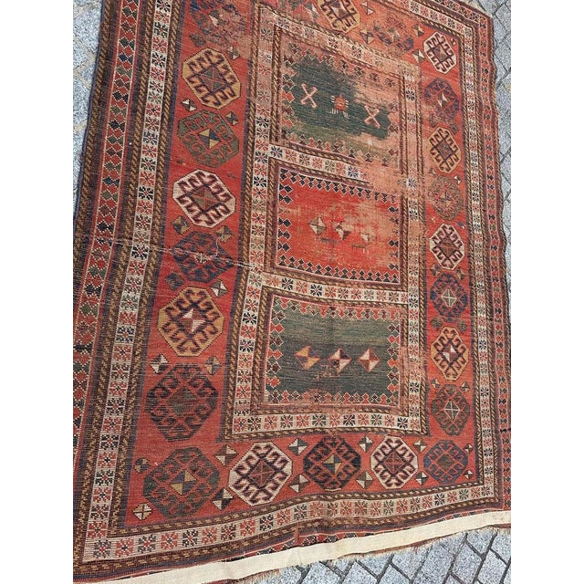 Beautiful late 19th century Caucasian rug with beautiful geometrical design and nice natural colours, in a distressed...