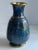 Decorate your table with this colorful vintage blue cloisonné vase. Made in China in the 1980s, the vase features...