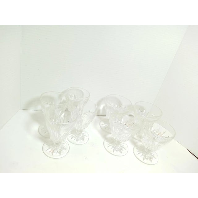 Eight pieces matching water/wine goblets made by Hazel Atlas in 1938. These are called Starlite. Four glasses are 4 1/8"...