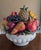 Add a vibrant splash of Mediterranean charm to your home decor with this gorgeous vintage Majolica-style ceramic fruit...