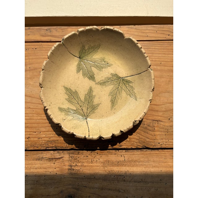 Vintage Nemadji Earth Pottery “Forest Impressions” decorative plate featuring delicate botanical leaf motifs beneath a...