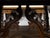An Italian Baroque style walnut Fratino console table from the 18th century, with carved lyre-shaped trestle base,...
