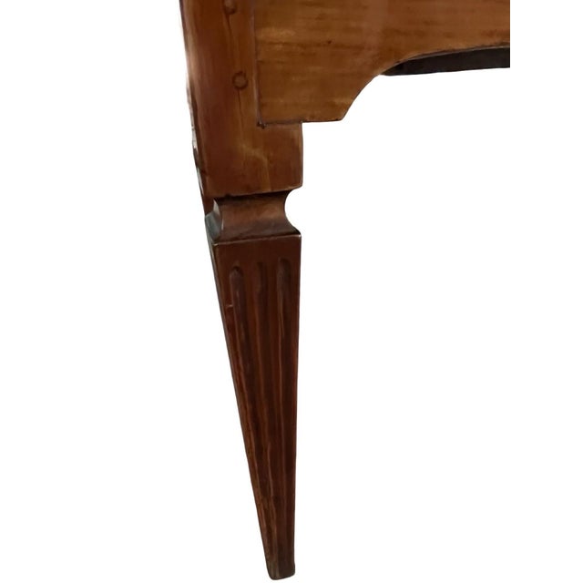 Neoclassical Louis XVI commode hand-made in Italy in the late 1700s using cherry. The commode has very straight and...