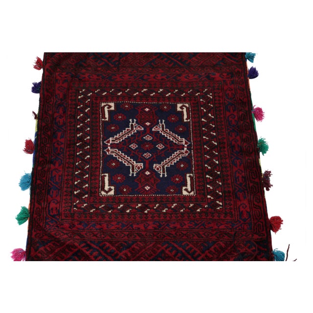 Hand knotted in wool, this 6x8 Baluch rug represents a new line of tribal carpets in the Modern Classics Collection by Rug...