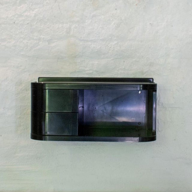 The shelf is high-gloss black and therefore difficult to photograph due to the reflections. The two side drawers can be...