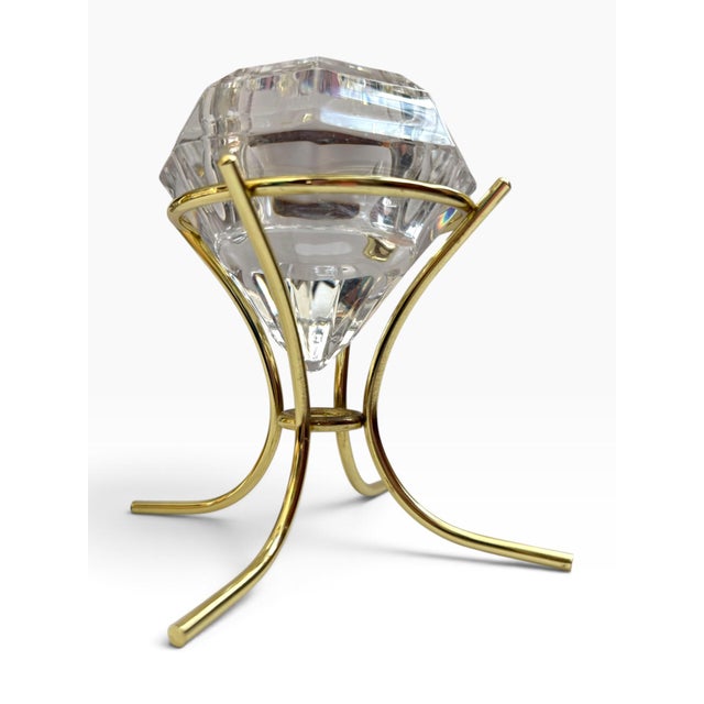 Striking vintage German 24% Bleikristall crystal candle holder or decorative vessel presented on a sculptural gold-tone...