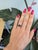 A 2.55-carat purple garnet glows in a rich grape-purple at the centre of this solid 14K white gold estate ring, surrounded...