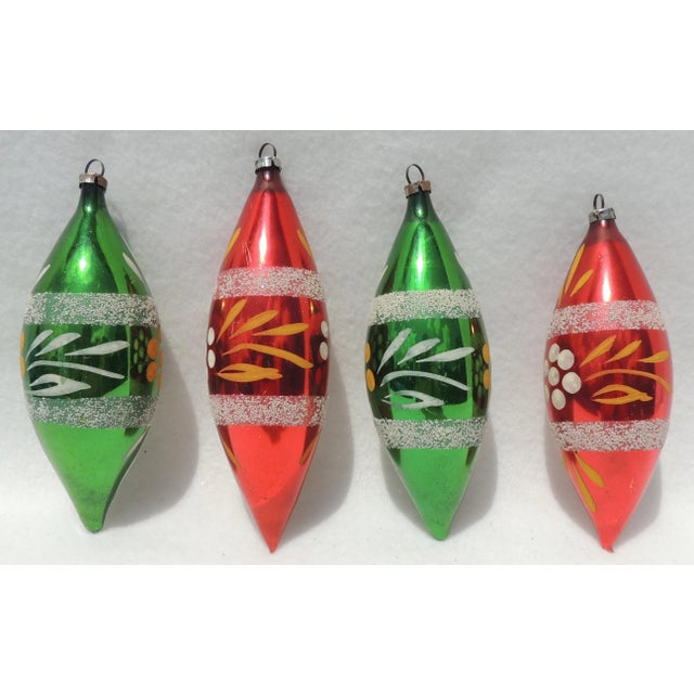 Wonderful set of four west germany red and green mercury glass teardrop Christmas tree ornaments. They are hand painted in...