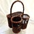 Charming vintage basket for a small wine picnic in the park. In dark stained wicker. Holds 2 bottles of wine plus an area...