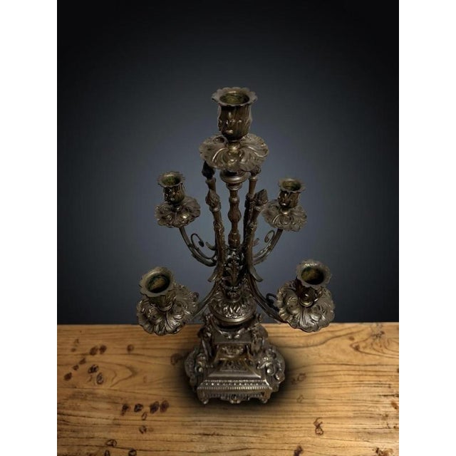 Elevate your decor with this impressive large antique French candelabra, masterfully crafted in bronze and set upon an...