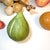 A colorful 10-piece collection of vintage hand-carved stone fruit, assembled for a richly varied tabletop display. The...