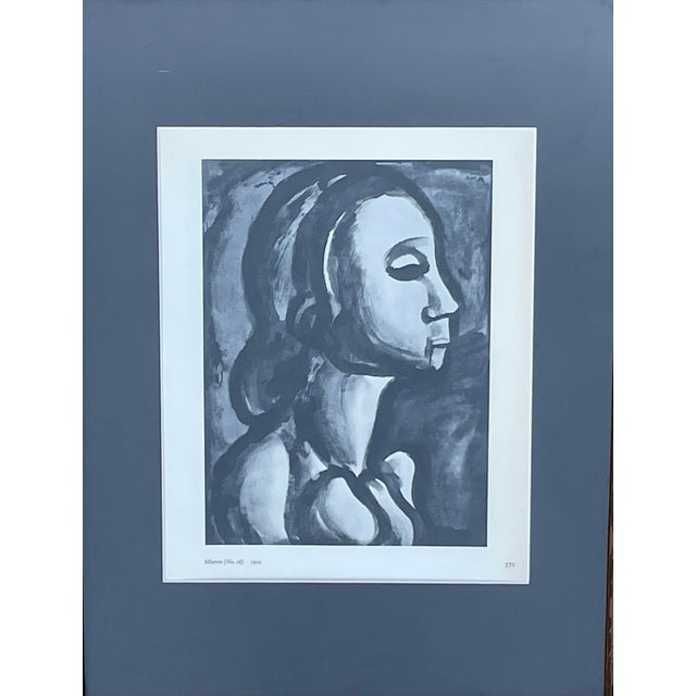 A beautiful print of a woman’s profile. Printed in 1961 in a book named Rouault by Pierre Courthion. Newly framed in a...