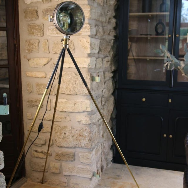 Rare and prestigious vintage lighting fixture, this tripod projector is a truly exceptional piece. Originally, it was an...