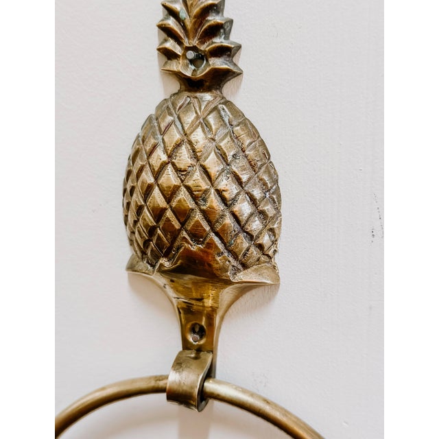 Vintage solid brass pineapple towel ring holder. For kitchen or bathroom. Has a lovely patina and two hole for hanging it...