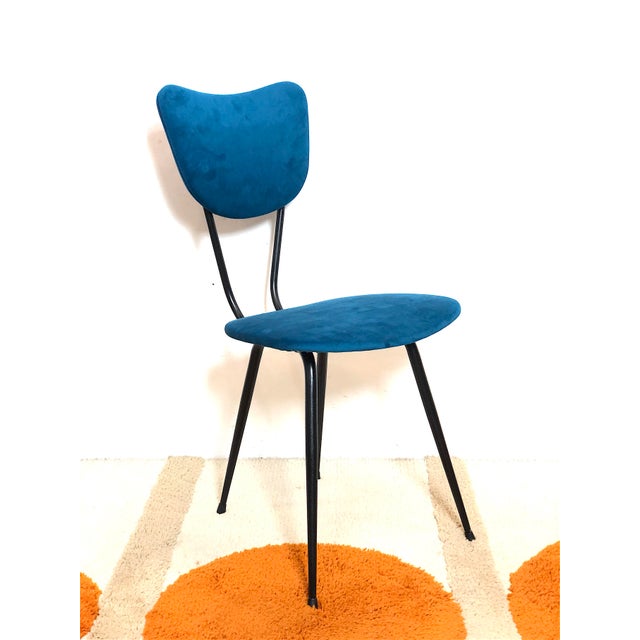 1960s Chair, Patented Model, Made in Italy. The chair is made with a metal frame painted in Matte Black, the seat and...