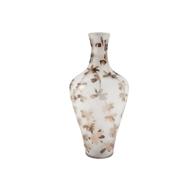 A monumental art glass vase. The glass is blown and frosted pattern over all flowers. The graceful shape perfectly...