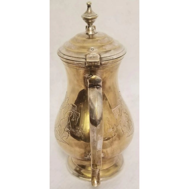 We love this extraordinary coffee pot because of the composition of the silver that through age, actually appears to have...