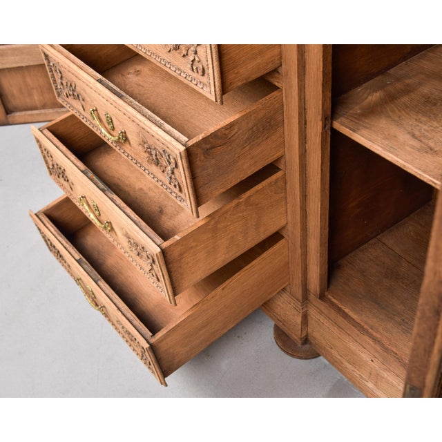 Found in England, this oak cabinet dates from approximately 1900. Cabinet is bare oak - the original finish has been...