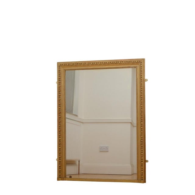 Fine 19th century French giltwood console table or wall mirror, having original glass with minor foxing and imperfections...