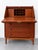 Elegant Danish Mid-Century Modern secretary desk dating from the 1960s, crafted in warm-toned wood and characterized by...