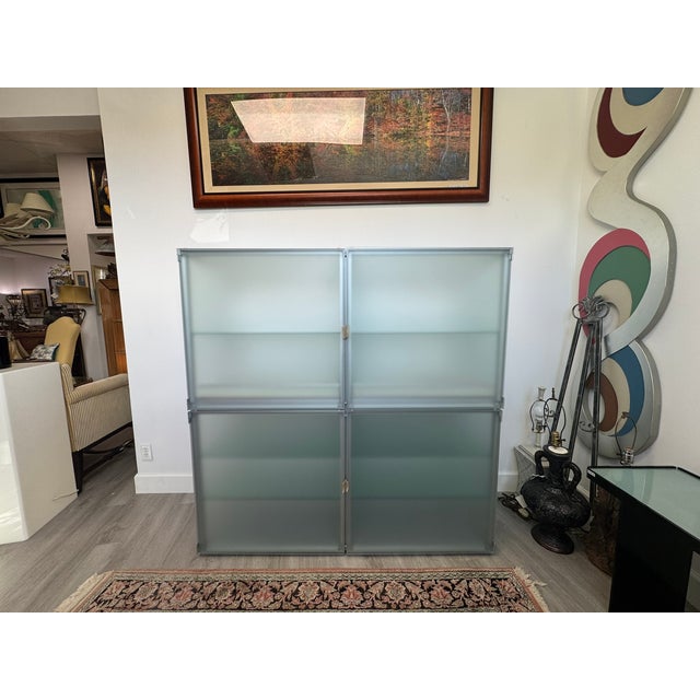 This sleek and modern storage piece by Interlübke, a renowned German furniture manufacturer, features a minimalist design...