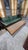 Absolutely gorgeous genuine MCM mid century modern emerald green wood and vinyl couch with rattan sides. Pulls out to a 2...